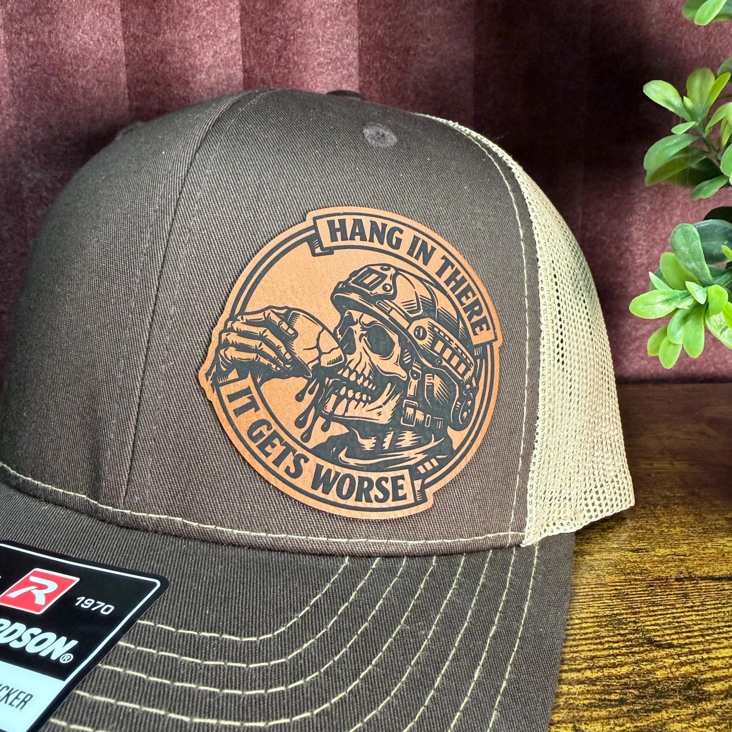 Hang In There, It Gets Worse Funny Skull Trucker Hat