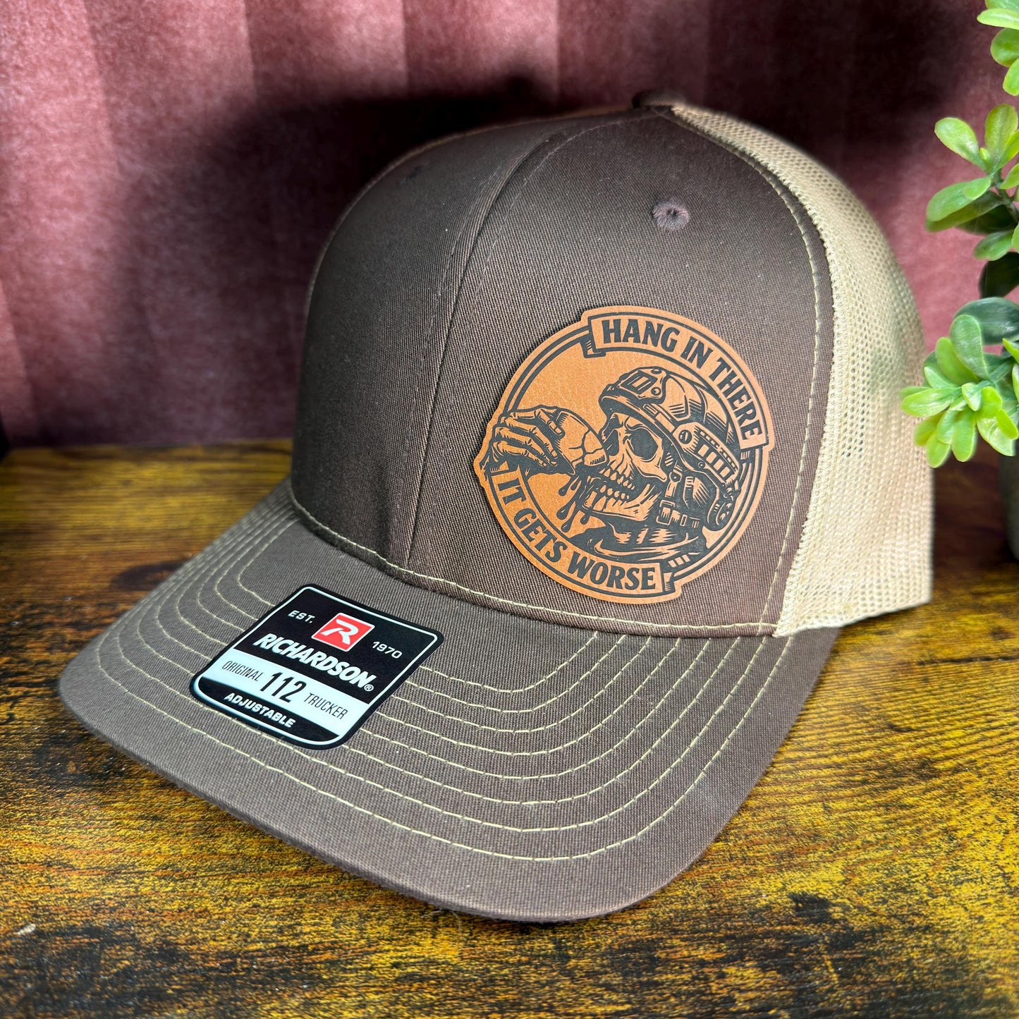 Hang In There, It Gets Worse Funny Skull Trucker Hat