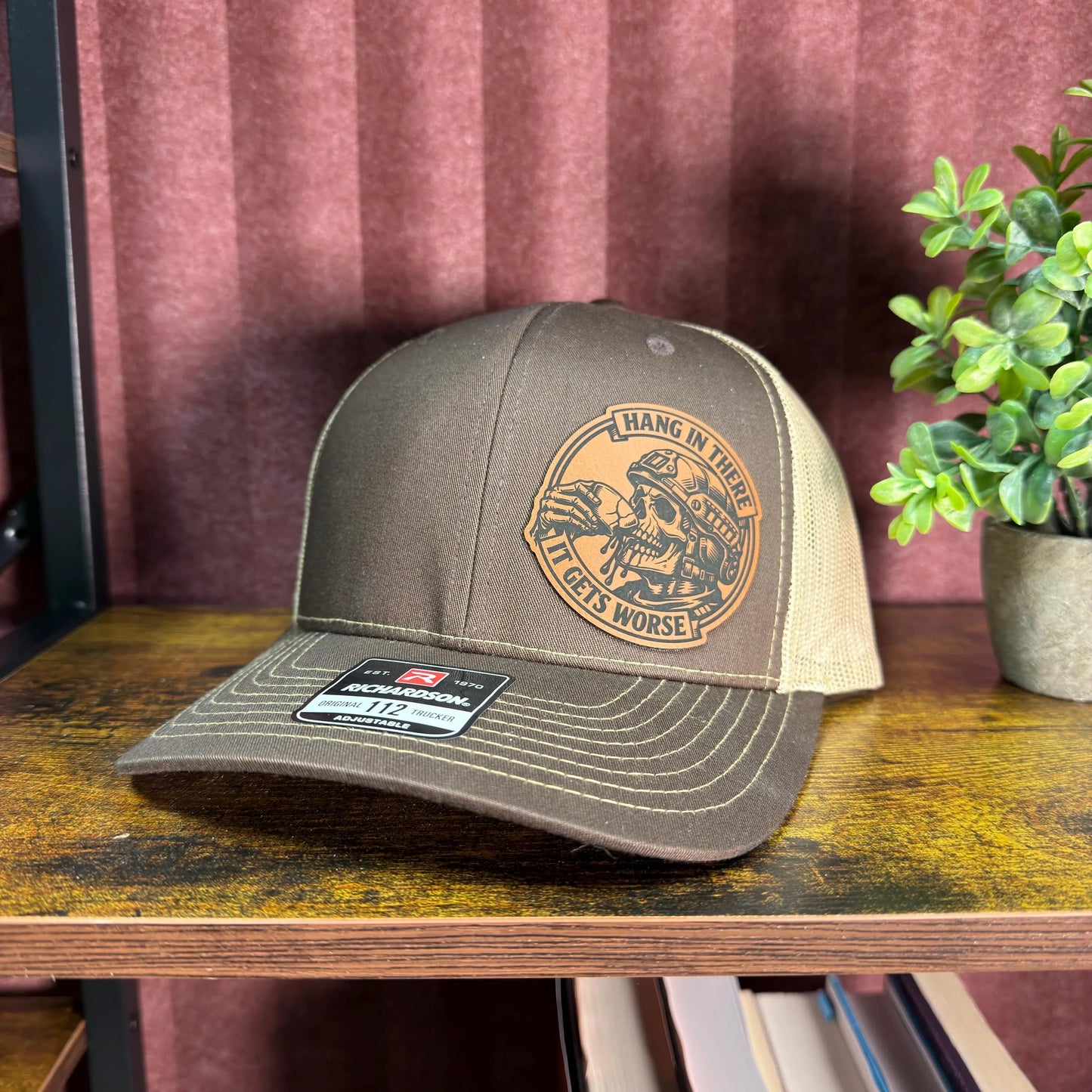 Hang In There, It Gets Worse Funny Skull Trucker Hat