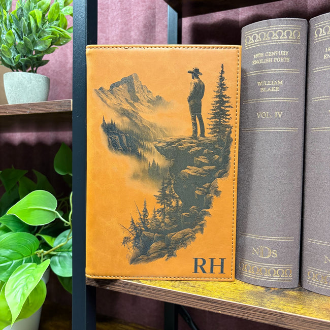 Buckskin refillable leatherette journal engraved with a cowboy and mountain scene and example RH monogram
