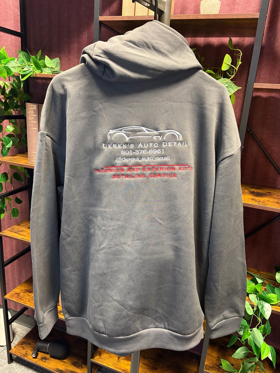 Back of Derek’s Auto Detail custom branded hoodie, made by Rocko’s