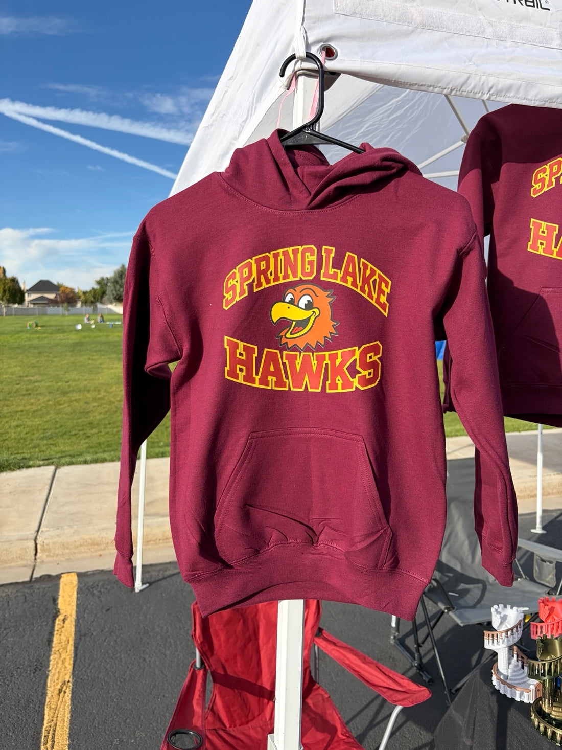 Burgundy Spring Lake Hawks hoodie for the elementary school fall festival